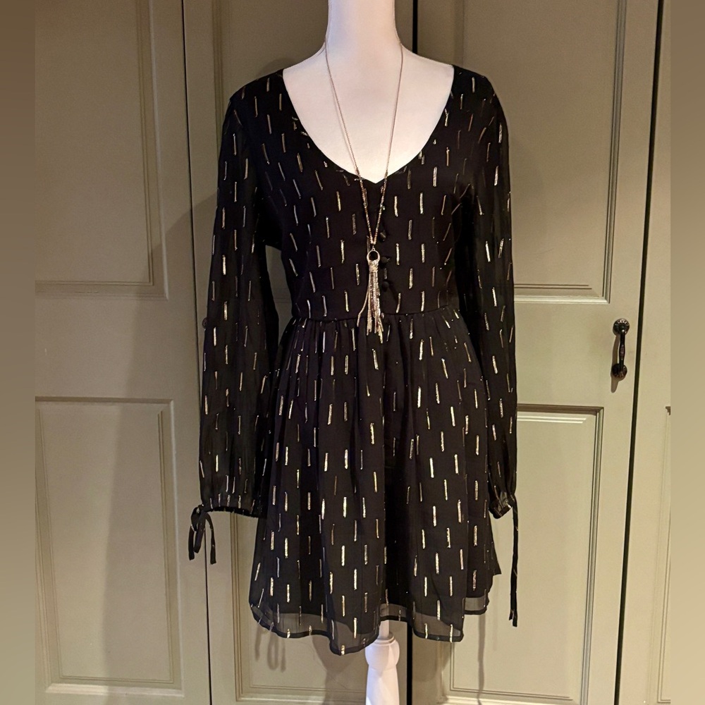 Black and gold  dress by B.O.G. collective in a size large